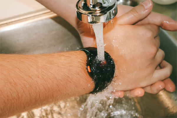 MGMove on wrist while wearer is washing hands in a sink